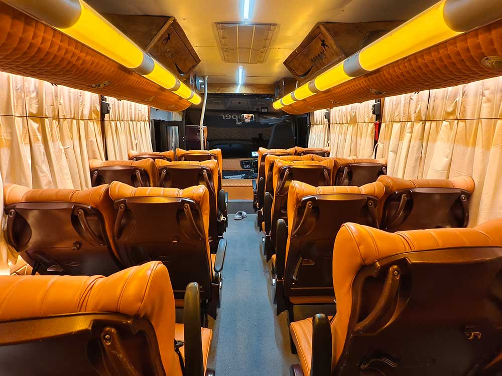book luxury mini bus in kerala